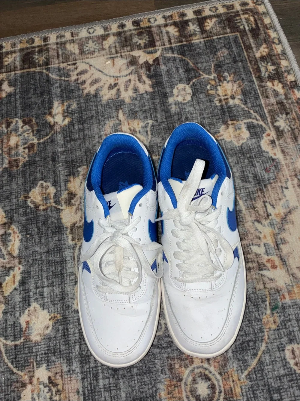 Nike White Sneakers with Blue Swoosh